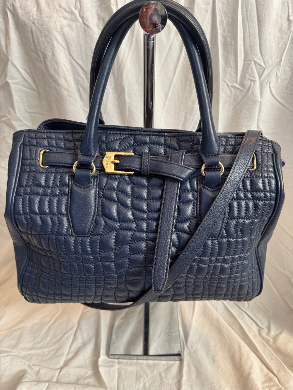 Aimee Kestenberg Quilted Navy Leather Satchel Handbag with shoulder strap.